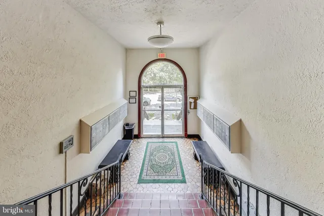 a view of entryway with a front door