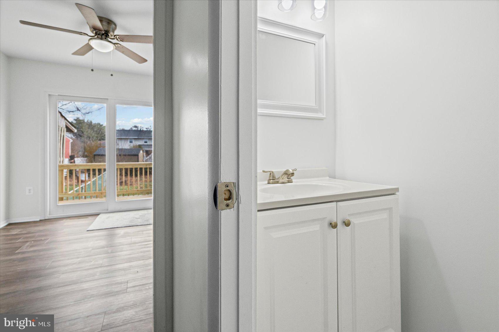 331 Laburnum Road Edgewood, MD 21040 - Photo 15 of 41 a bathroom with a sink and a mirror
