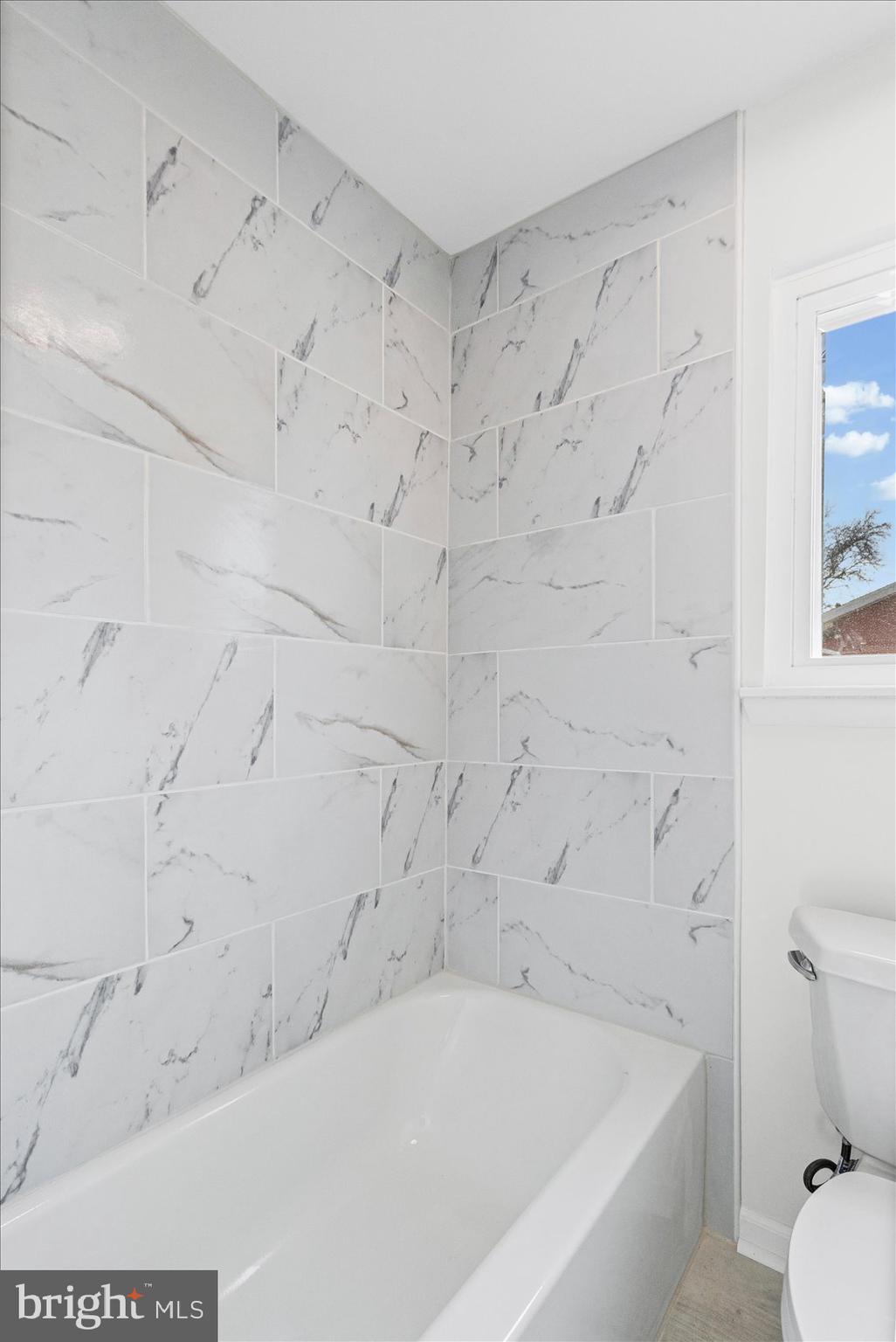 331 Laburnum Road Edgewood, MD 21040 - Photo 28 of 41 a bathroom with a bathtub and a toilet