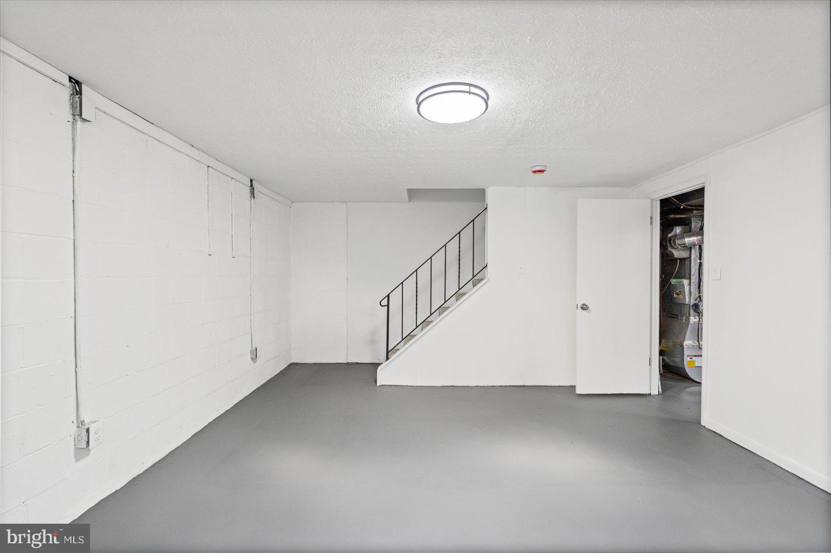 331 Laburnum Road Edgewood, MD 21040 - Photo 29 of 41 a view of an empty room with stairs