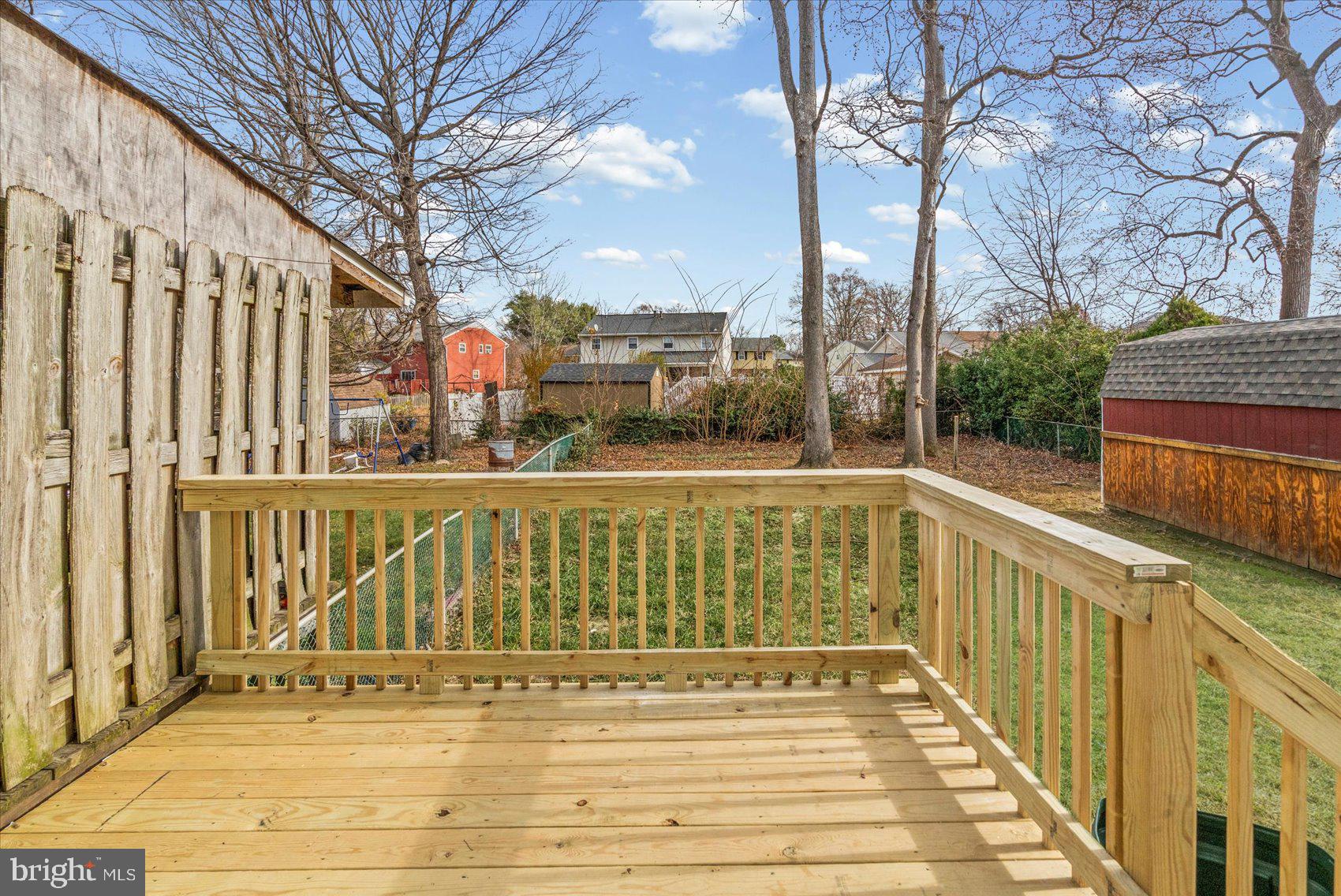 331 Laburnum Road Edgewood, MD 21040 - Photo 33 of 41 a view of a balcony with wooden floor and fence and a bench