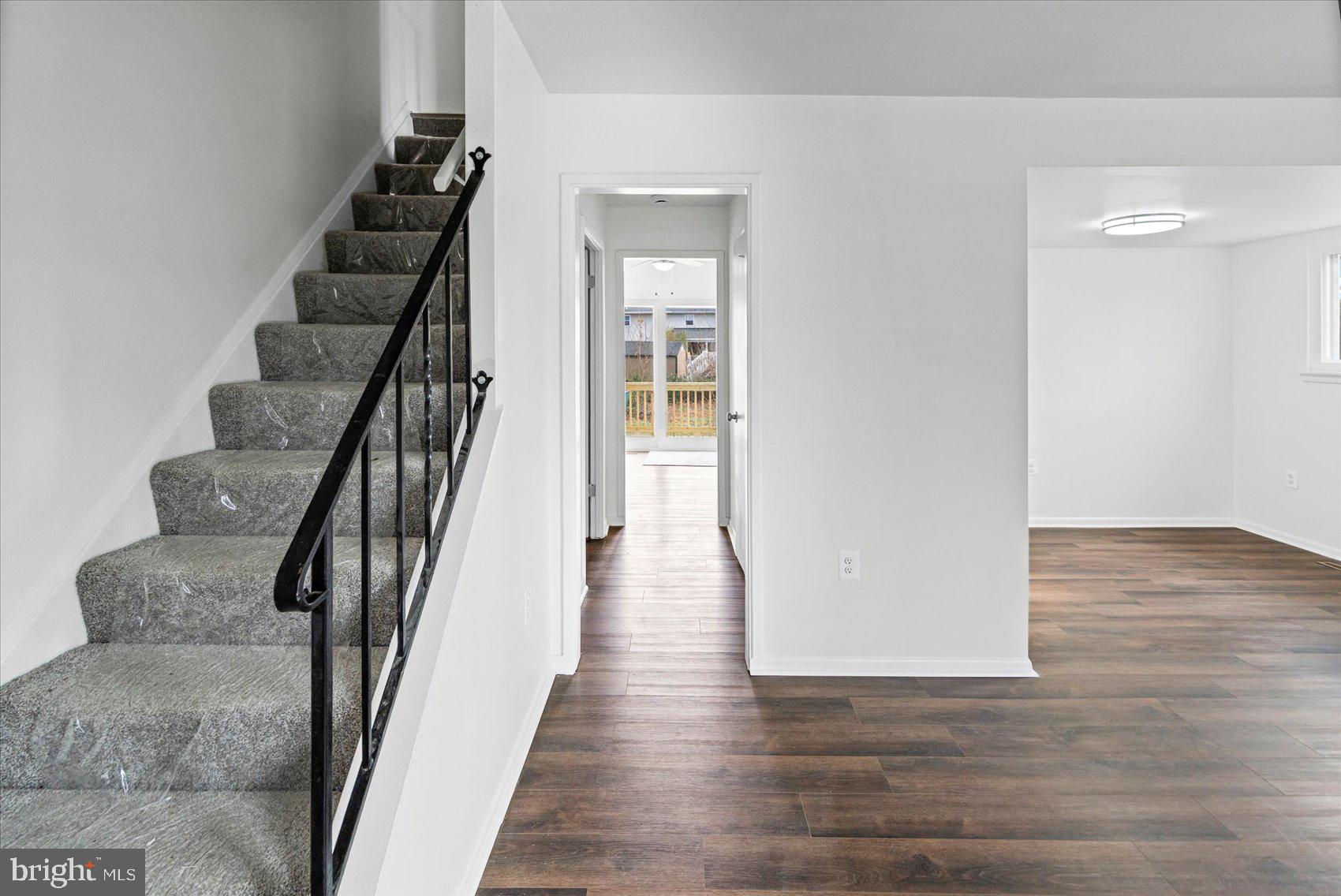 331 Laburnum Road Edgewood, MD 21040 - Photo 4 of 41 a view of a hallway with wooden floor and staircase