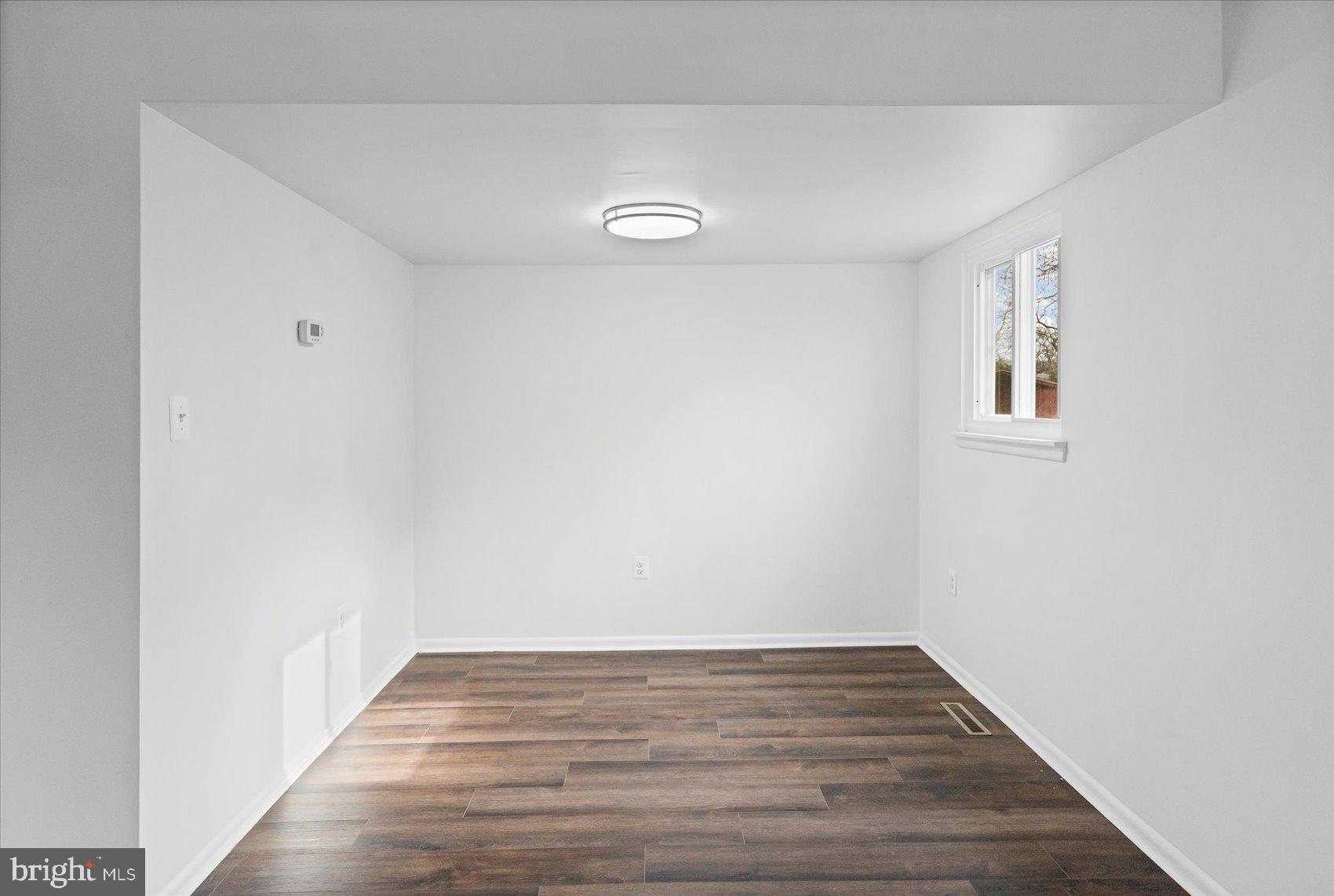 331 Laburnum Road Edgewood, MD 21040 - Photo 6 of 41 a view of an empty room with wooden floor
