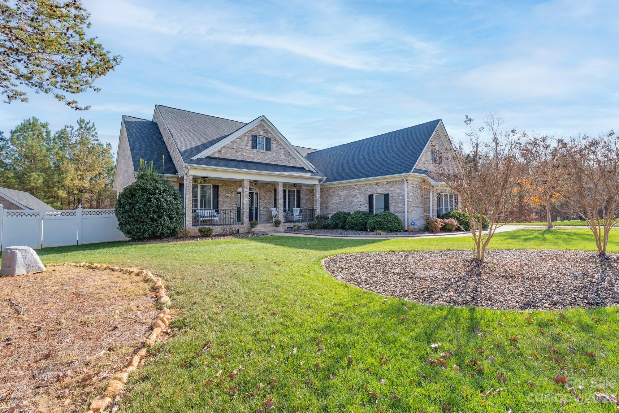 5896 Morning Star Road Lake Wylie, SC 29710 - Photo 2 of 40 a front view of a house with a yard