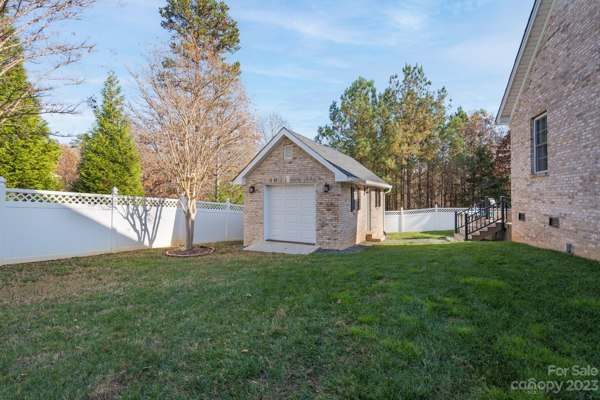 5896 Morning Star Road Lake Wylie, SC 29710 - Photo 34 of 40 a front view of a house with a yard and trees