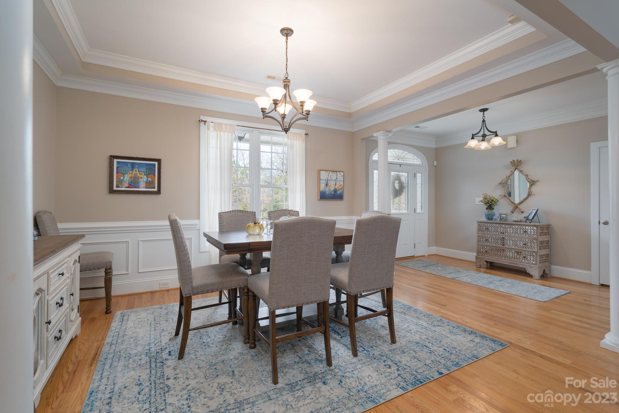5896 Morning Star Road Lake Wylie, SC 29710 - Photo 7 of 40 a view of a dining room with furniture window and wooden floor
