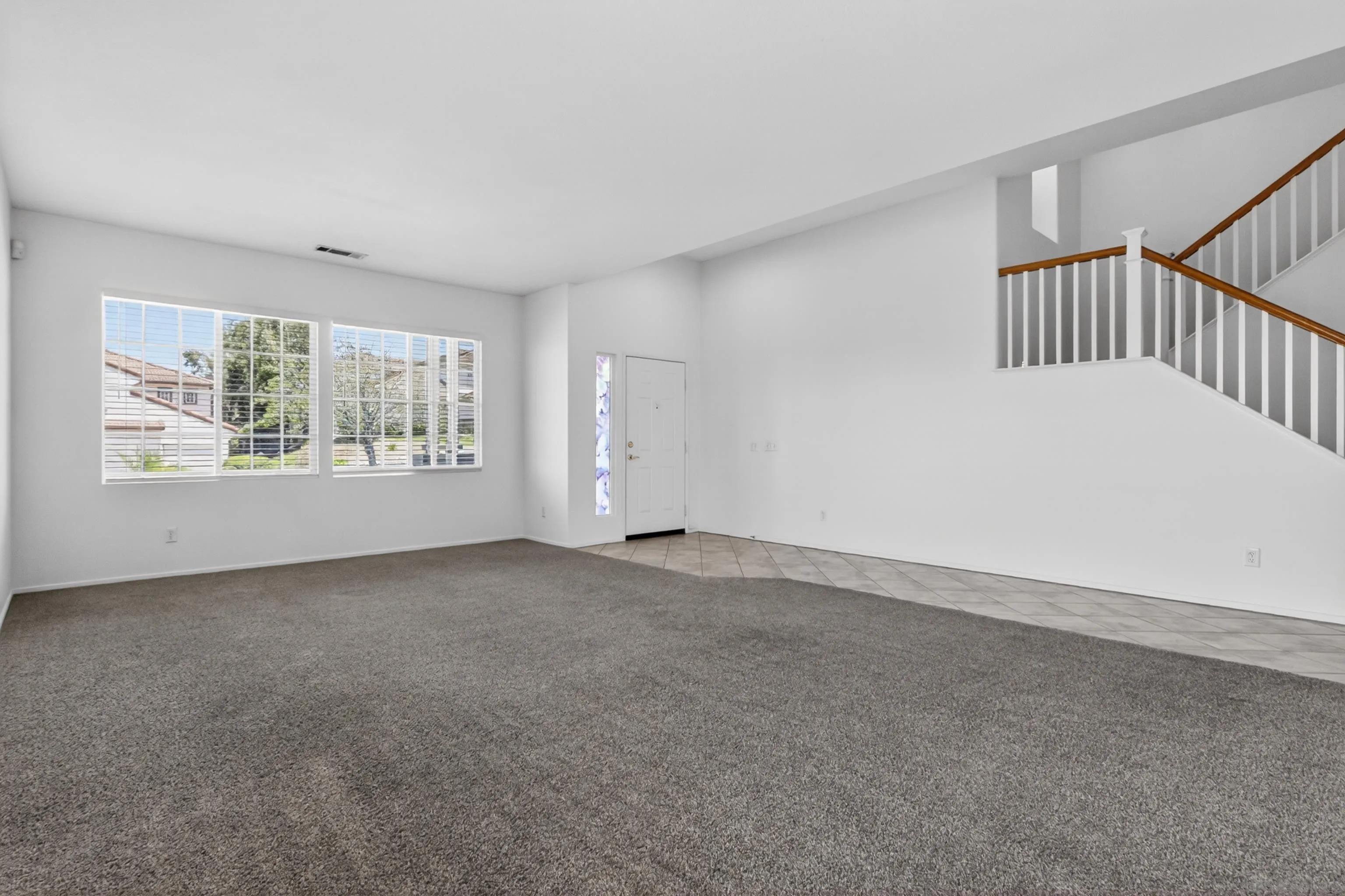 1432 Belmont Park Road Oceanside, CA 92057 - Photo 17 of 54 a view of an empty room with a window