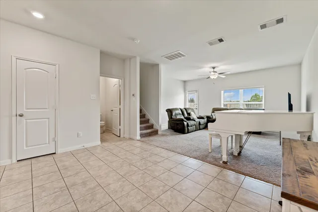 a view of a livingroom with furniture and furniture