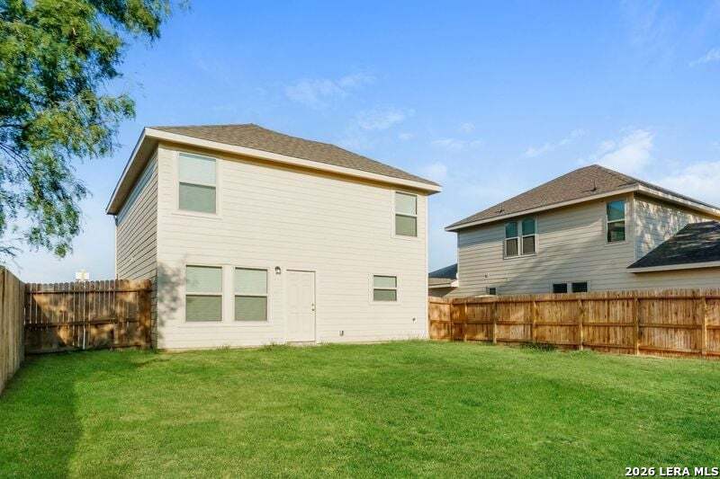 10706 Apple Pie Road San Antonio, TX 78224 - Photo 3 of 14 a front view of a house with a yard