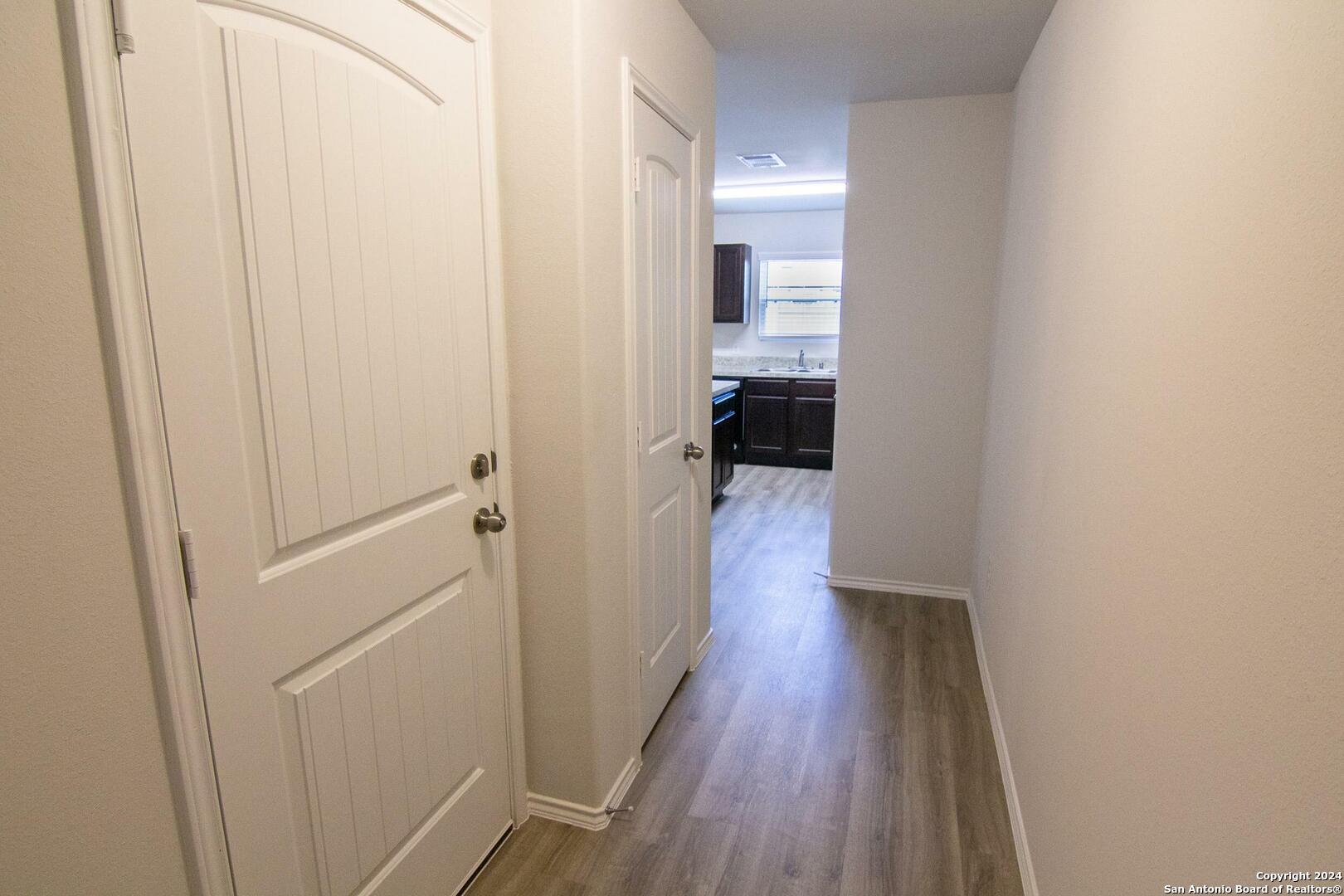 10706 Apple Pie Road San Antonio, TX 78224 - Photo 6 of 14 a view of a room with wooden floor