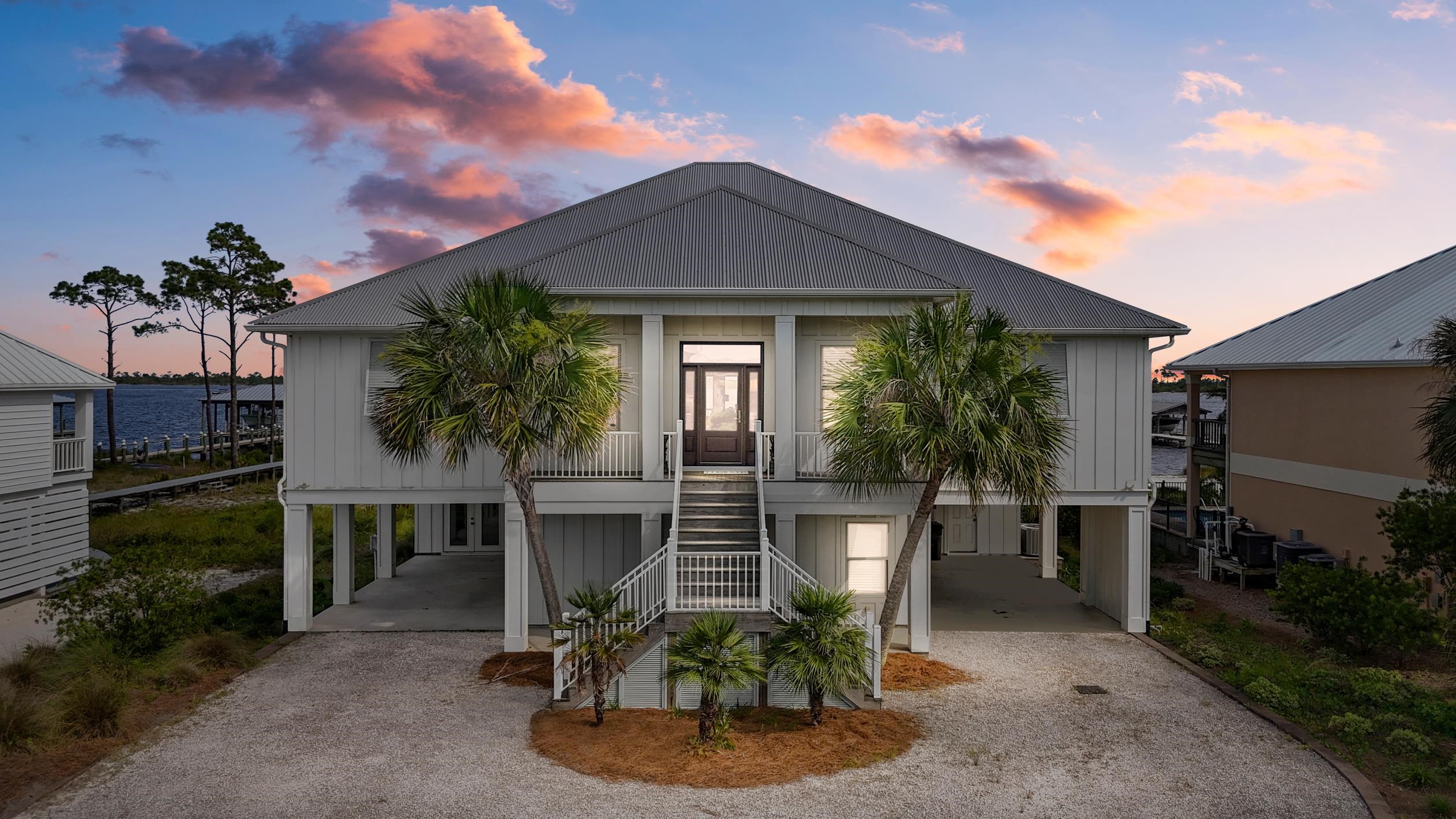 32760 River Road Orange Beach, AL 36561 - Photo 1 of 49 View of home at Sunset