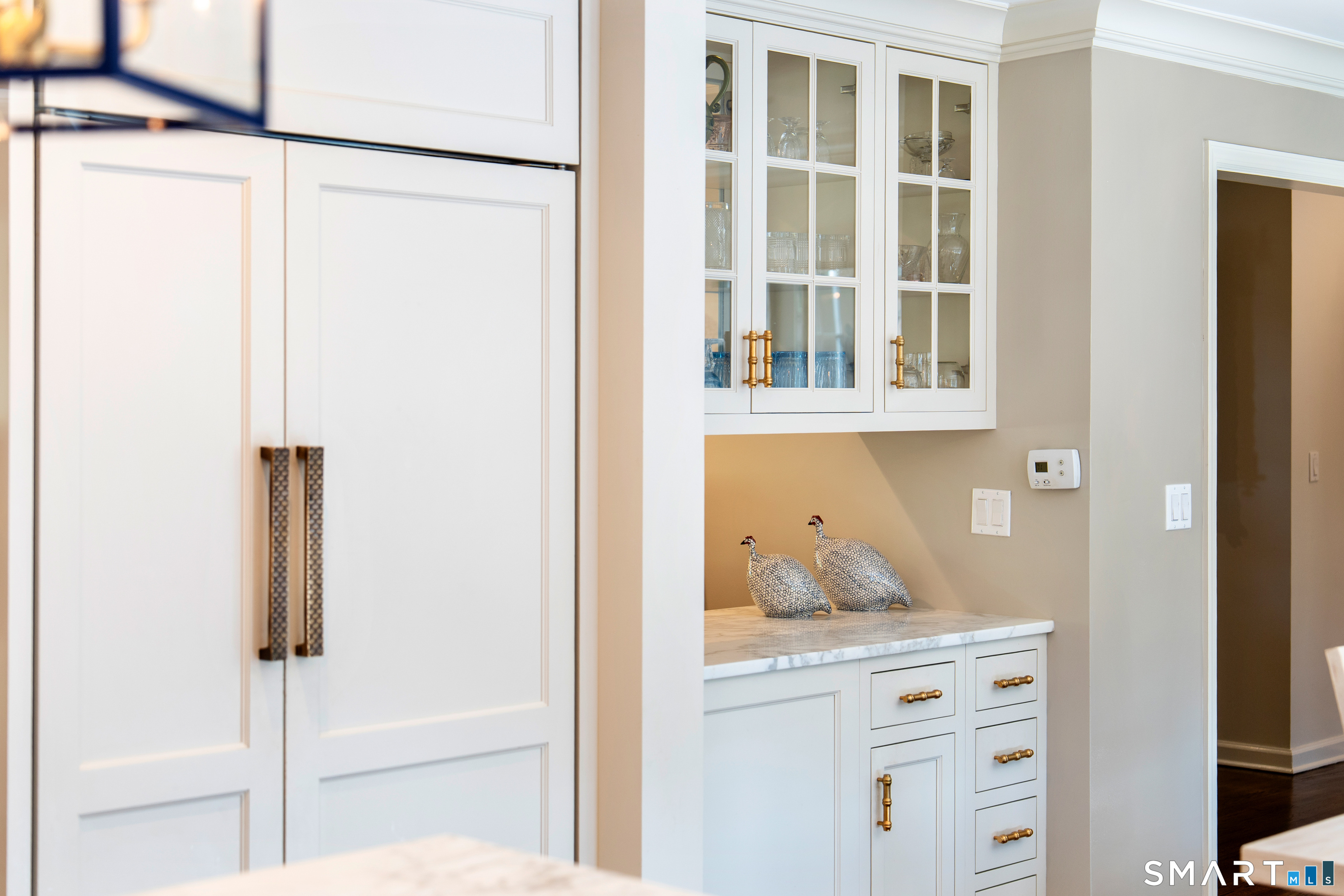 11 McLaren Road South Darien, CT 06820 - Photo 10 of 40 a cabinet with window in it