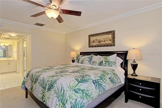 a bathroom with a sink mirror and vanity