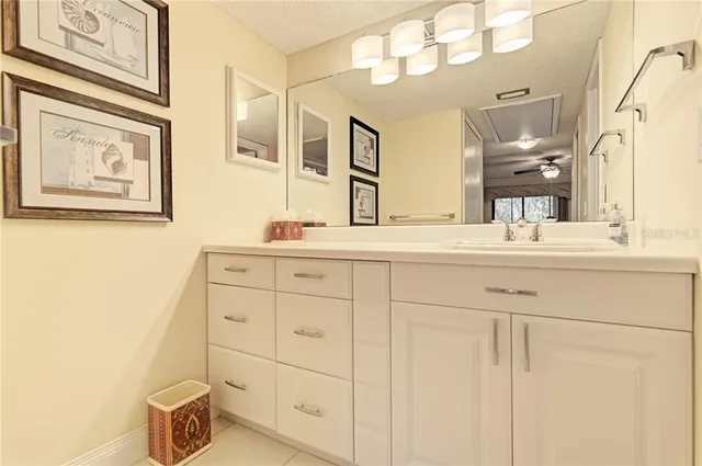 a white toilet sitting next to a bath tub