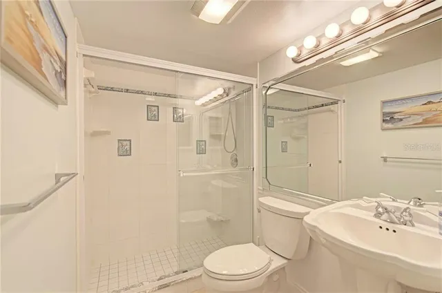 a room with furniture and a potted plant