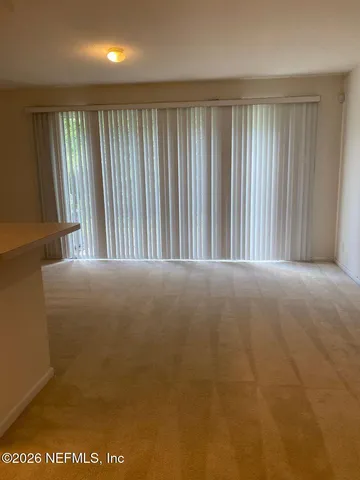 a view of empty room with window