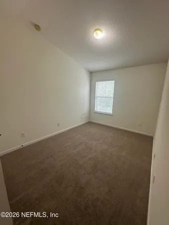 an empty room with a window