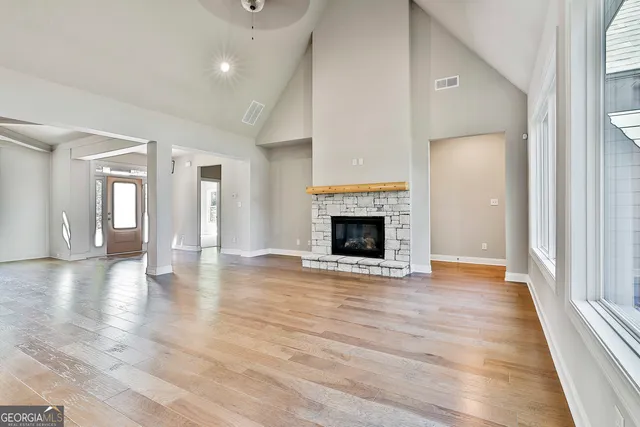 a view of kitchen with wooden floor