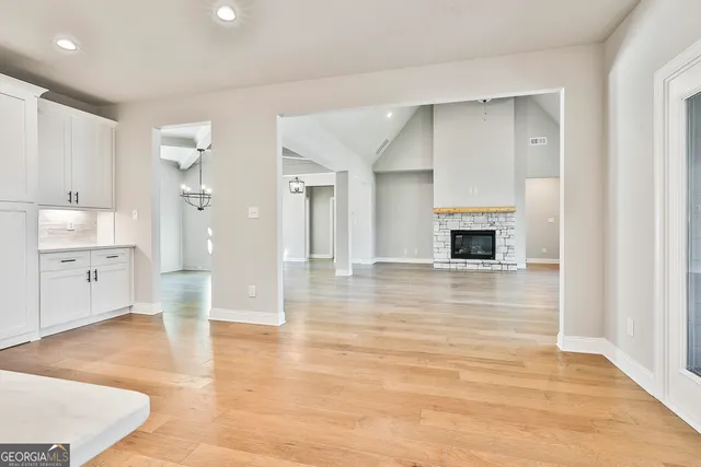 a view of closet area with empty racks