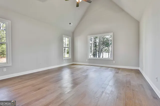 a view of closet area with empty racks