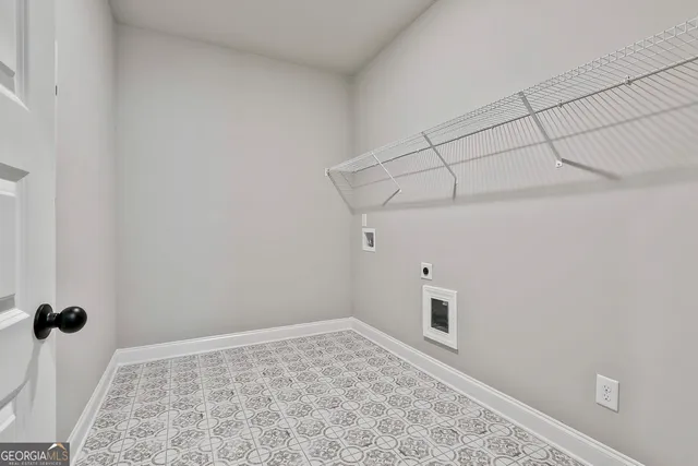 a view of a hallway with a room