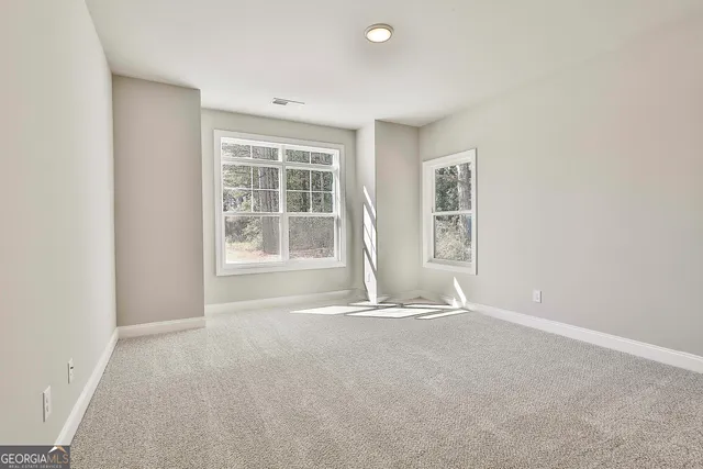 a bathroom with a double vanity sink