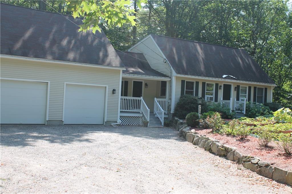 473 Loop Road Wells, ME 04090 - Photo 1 of 33 Front of House with stone wall.