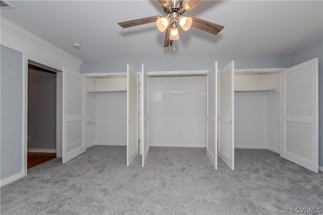 8205 Buffin Road Henrico, VA 23231 - Photo 11 of 42 a view of an empty room with a ceiling fan