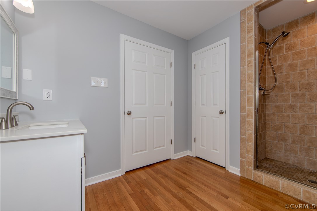 8205 Buffin Road Henrico, VA 23231 - Photo 14 of 42 a view of a bathroom with a sink and shower