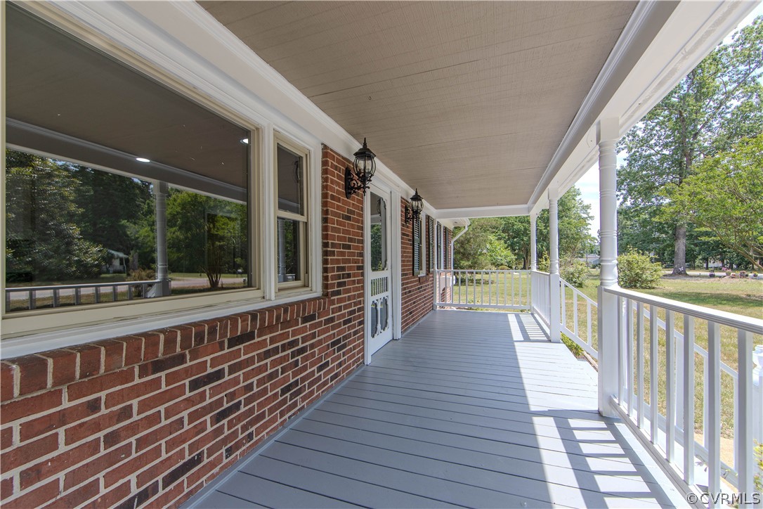 8205 Buffin Road Henrico, VA 23231 - Photo 2 of 42 a view of a balcony with wooden floor