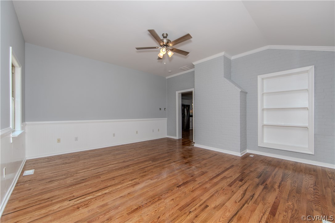 8205 Buffin Road Henrico, VA 23231 - Photo 21 of 42 wooden floor in an empty room with a window