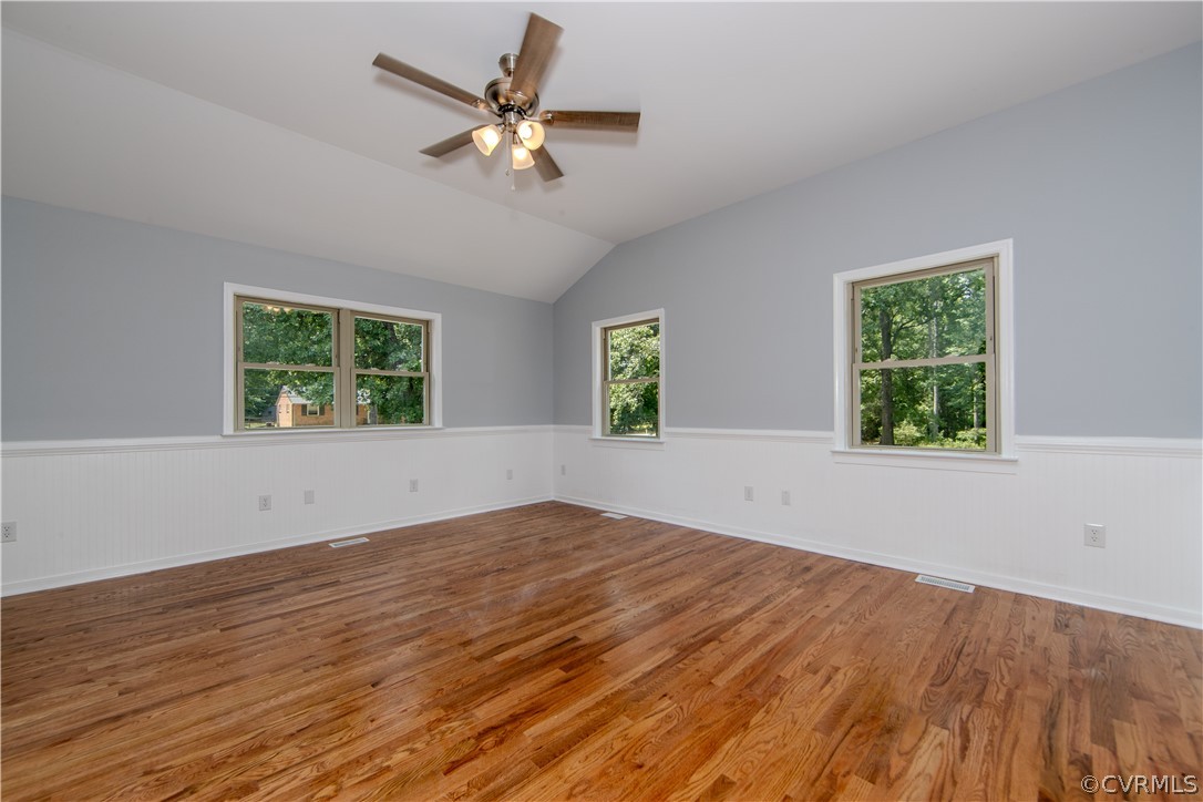 8205 Buffin Road Henrico, VA 23231 - Photo 22 of 42 a view of empty room with wooden floor and fan