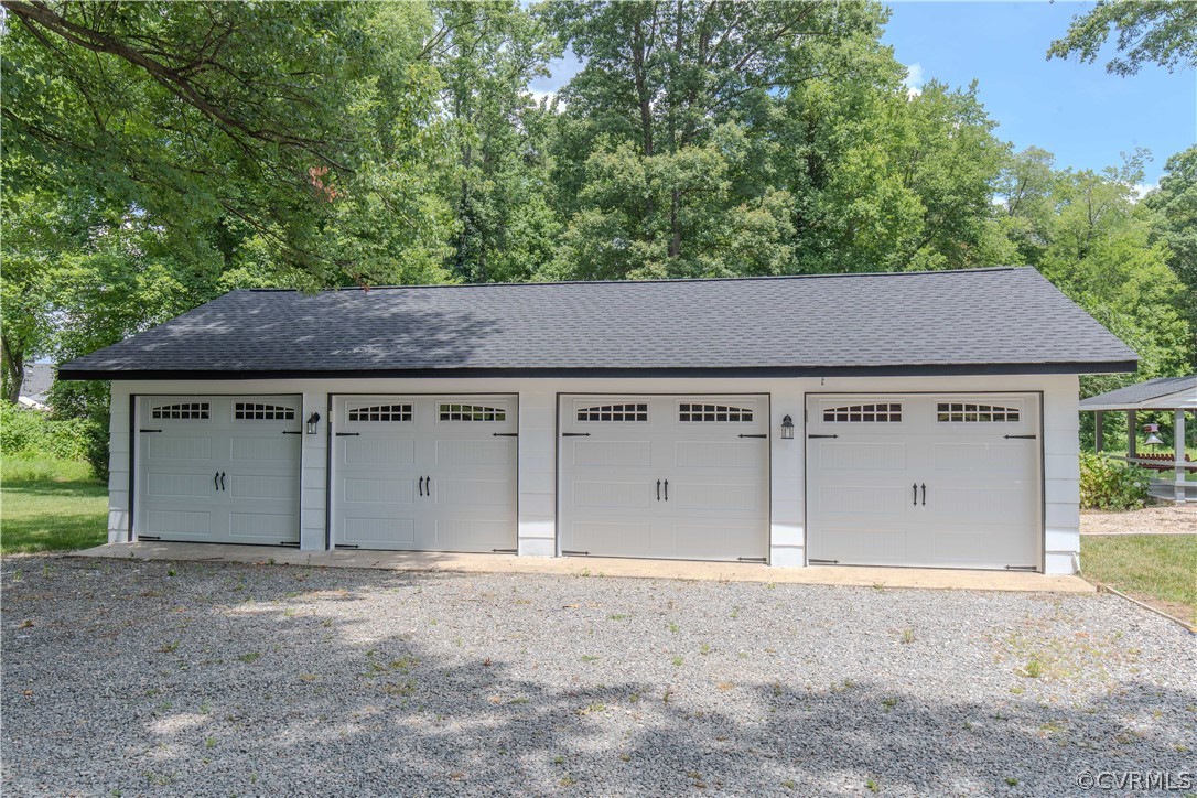 8205 Buffin Road Henrico, VA 23231 - Photo 25 of 42 a view of a house with a backyard