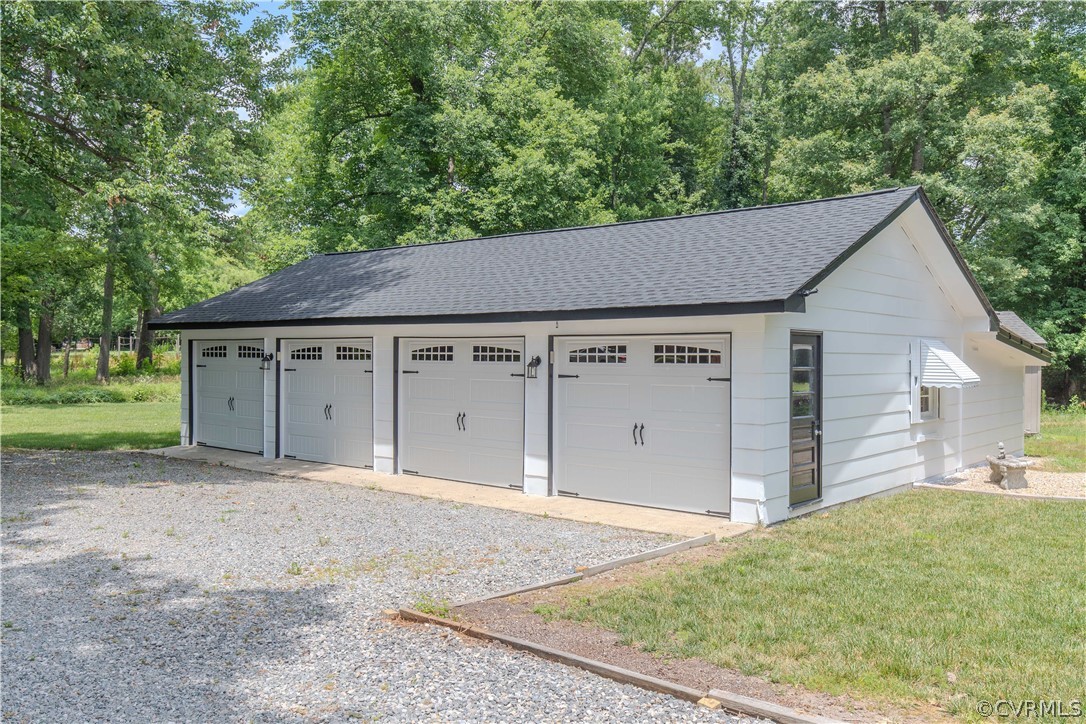 8205 Buffin Road Henrico, VA 23231 - Photo 26 of 42 a house with trees in the background