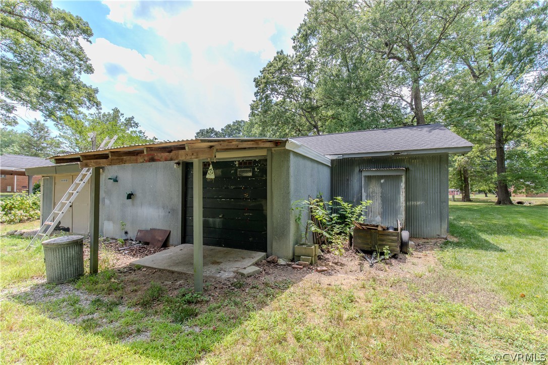 8205 Buffin Road Henrico, VA 23231 - Photo 34 of 42 a view of a house with a yard and sitting area
