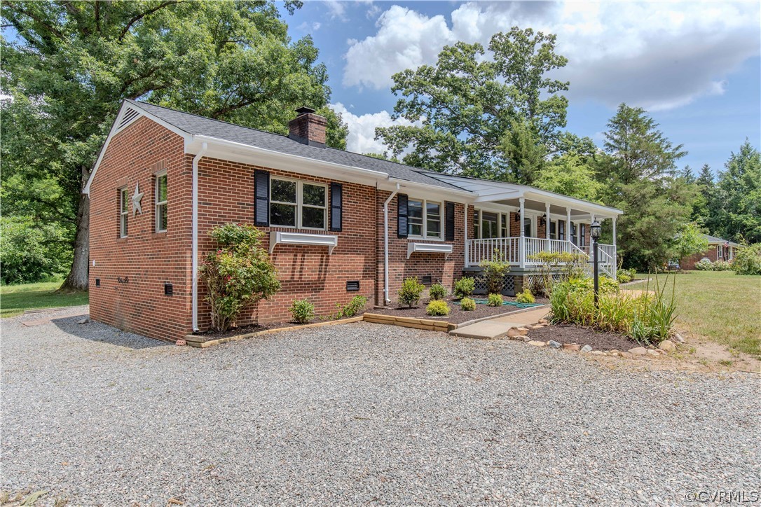 8205 Buffin Road Henrico, VA 23231 - Photo 36 of 42 front view of a house with a yard