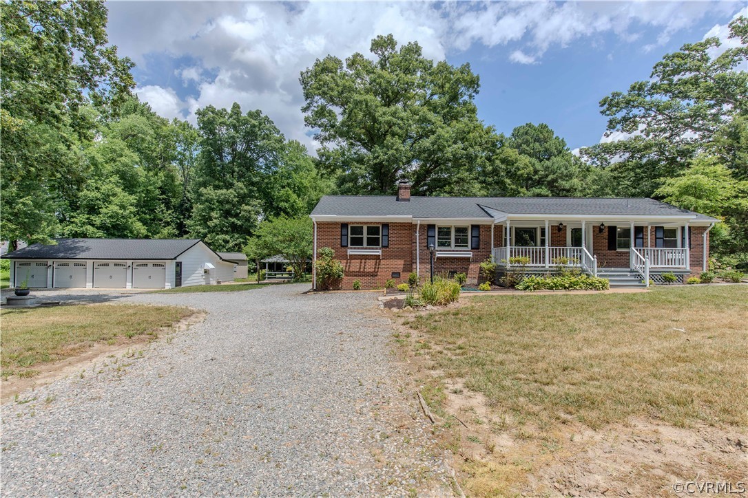 8205 Buffin Road Henrico, VA 23231 - Photo 40 of 42 front view of a house with a yard