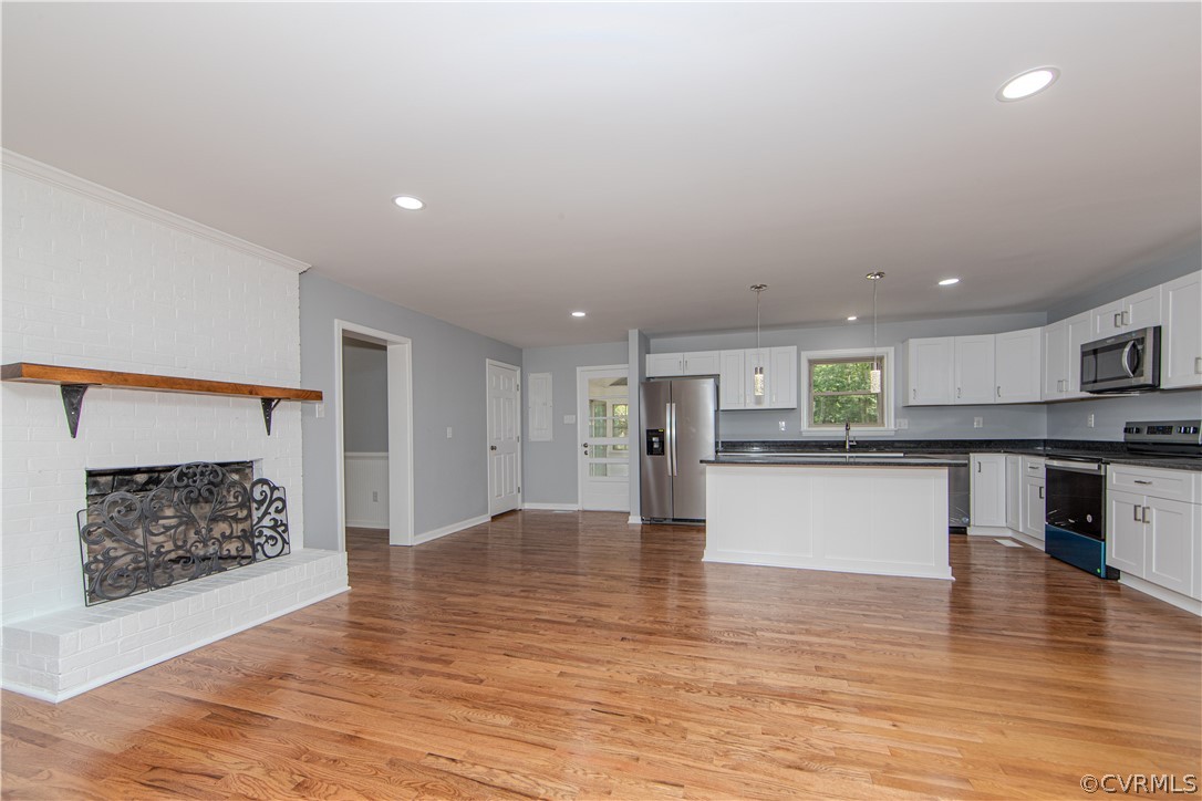 8205 Buffin Road Henrico, VA 23231 - Photo 5 of 42 a view of kitchen with kitchen island and stainless steel appliances