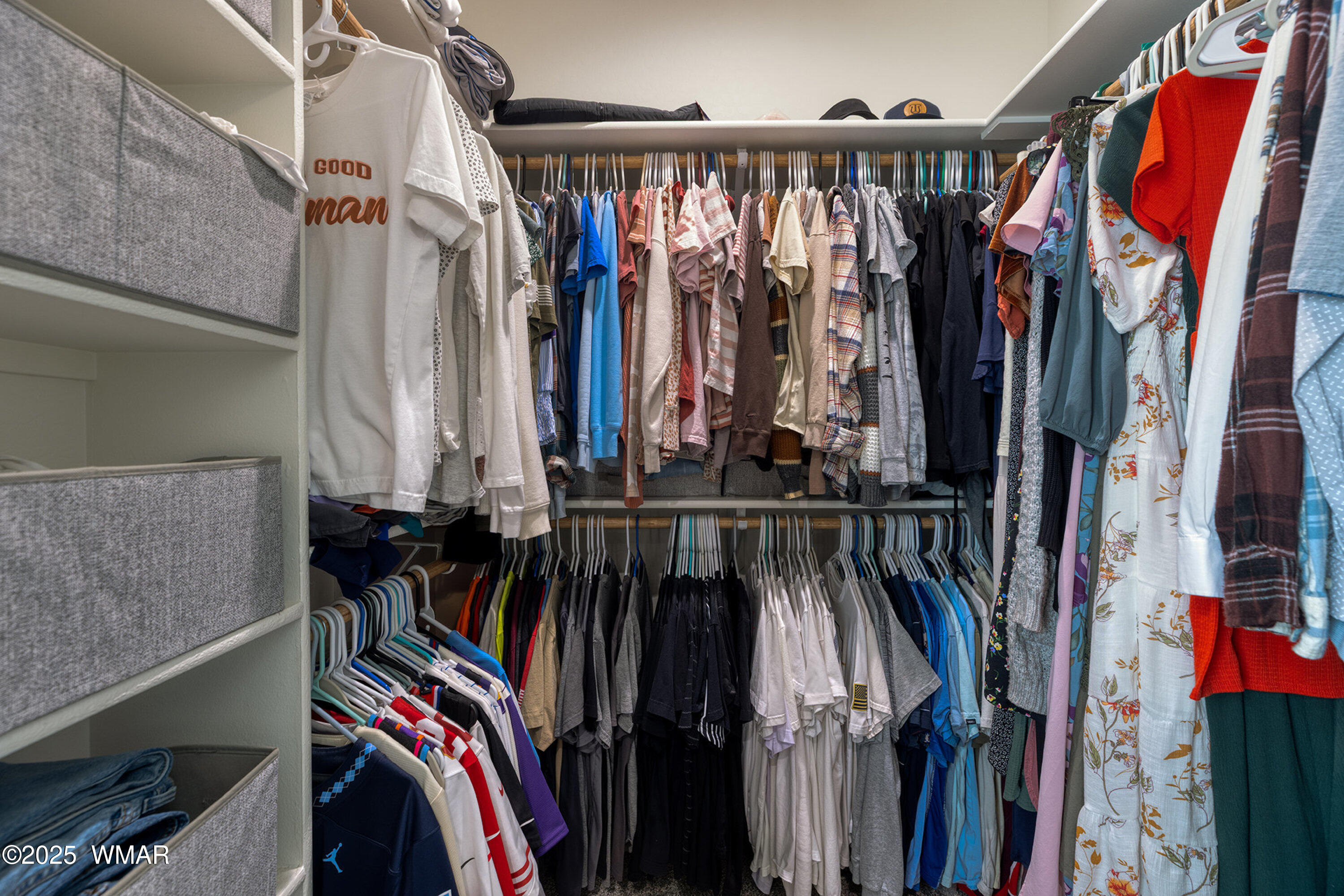799 Cobble Lane Taylor, AZ 85939 - Photo 12 of 34 a view of walk in closet with clothes and shoes