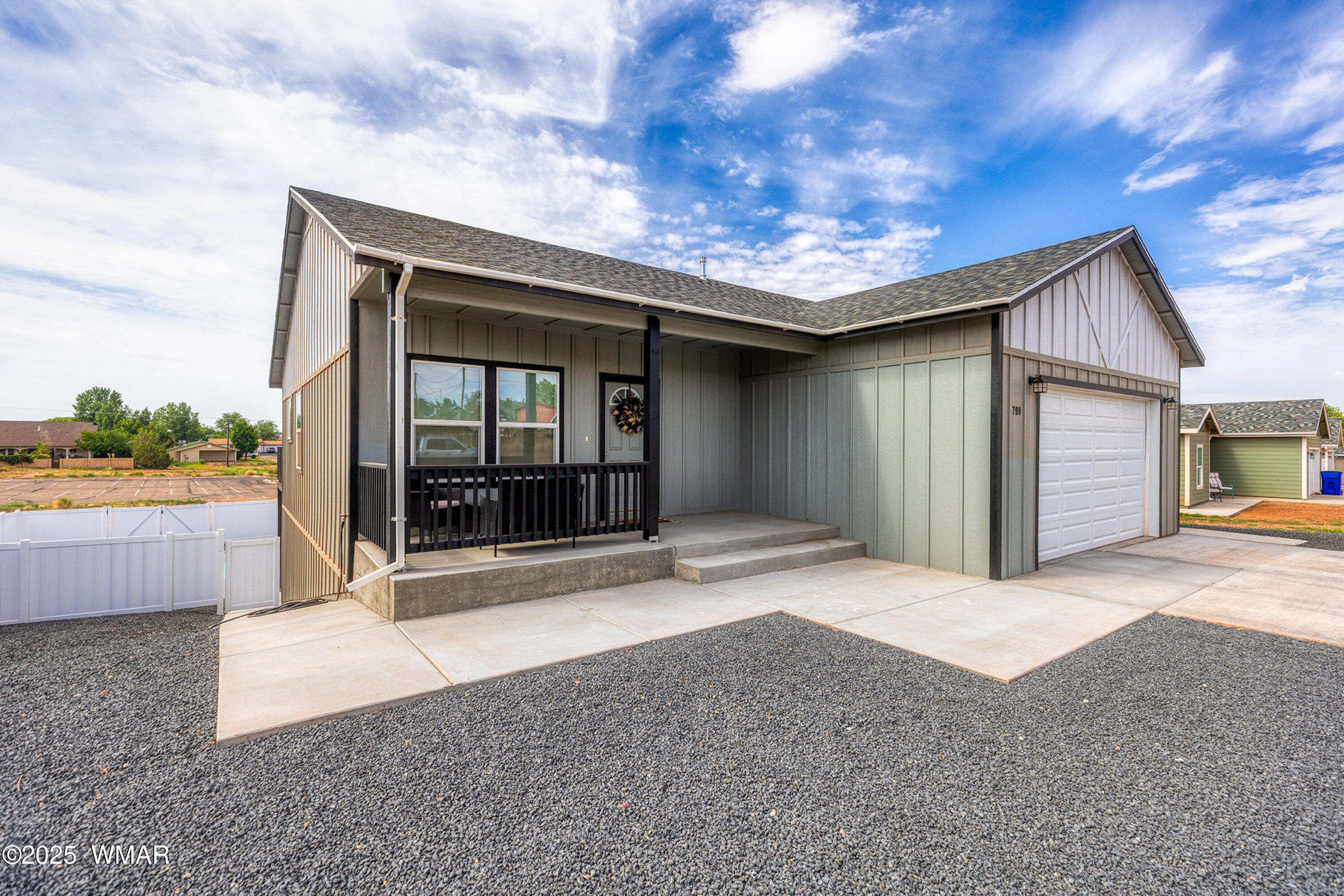 799 Cobble Lane Taylor, AZ 85939 - Photo 2 of 34 a view of a house with backyard and a garden
