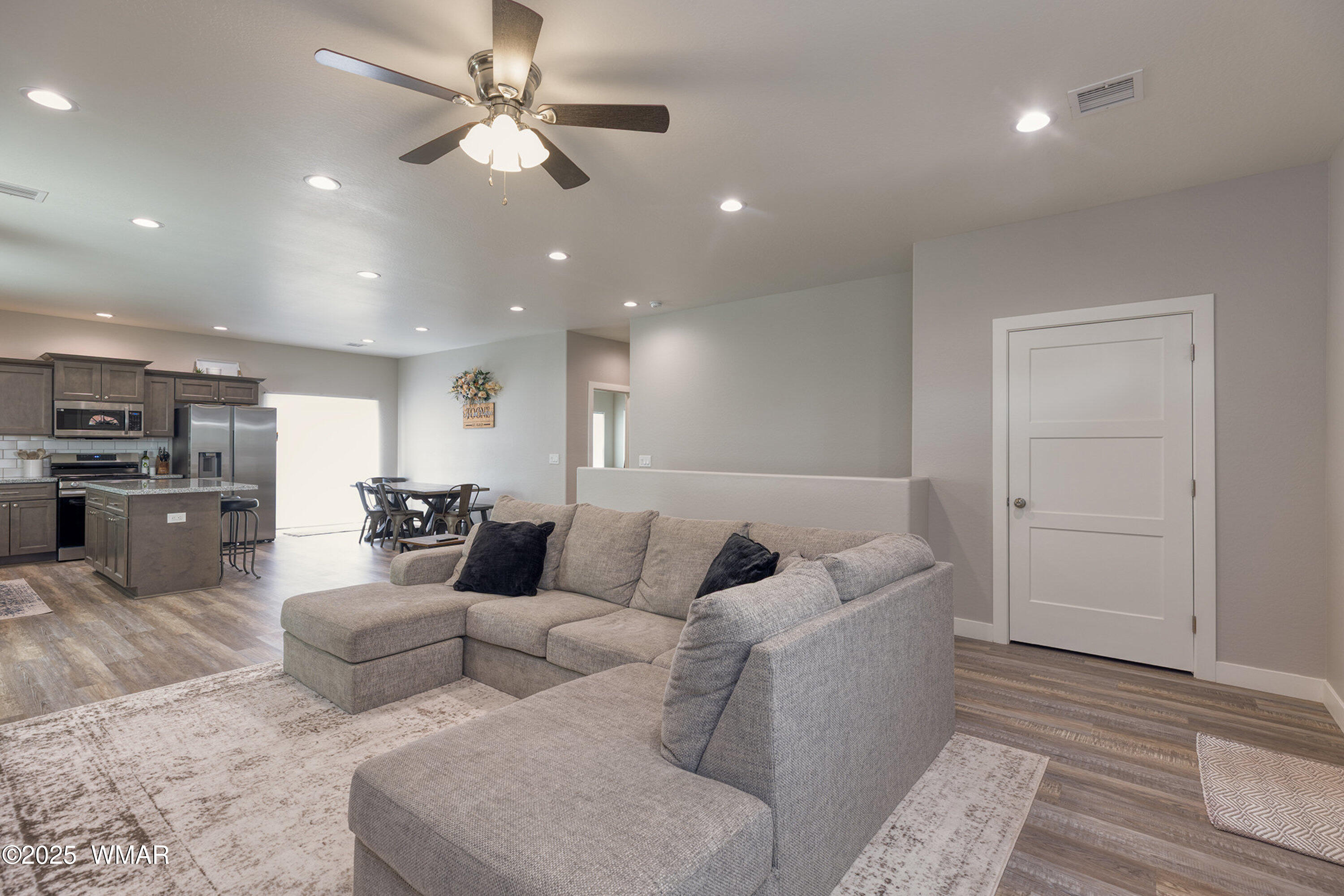 799 Cobble Lane Taylor, AZ 85939 - Photo 5 of 34 a living room with furniture and a ceiling fan