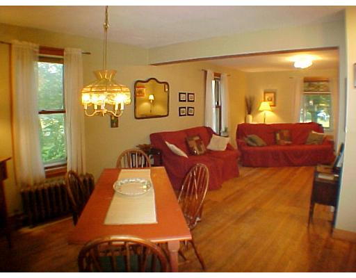 395 Bridge Road Northampton, MA 01062 - Photo 3 of 10 a living room with furniture and a chandelier