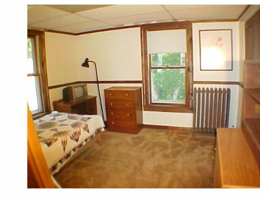 395 Bridge Road Northampton, MA 01062 - Photo 8 of 10 a bedroom with a bed and a window with outer view