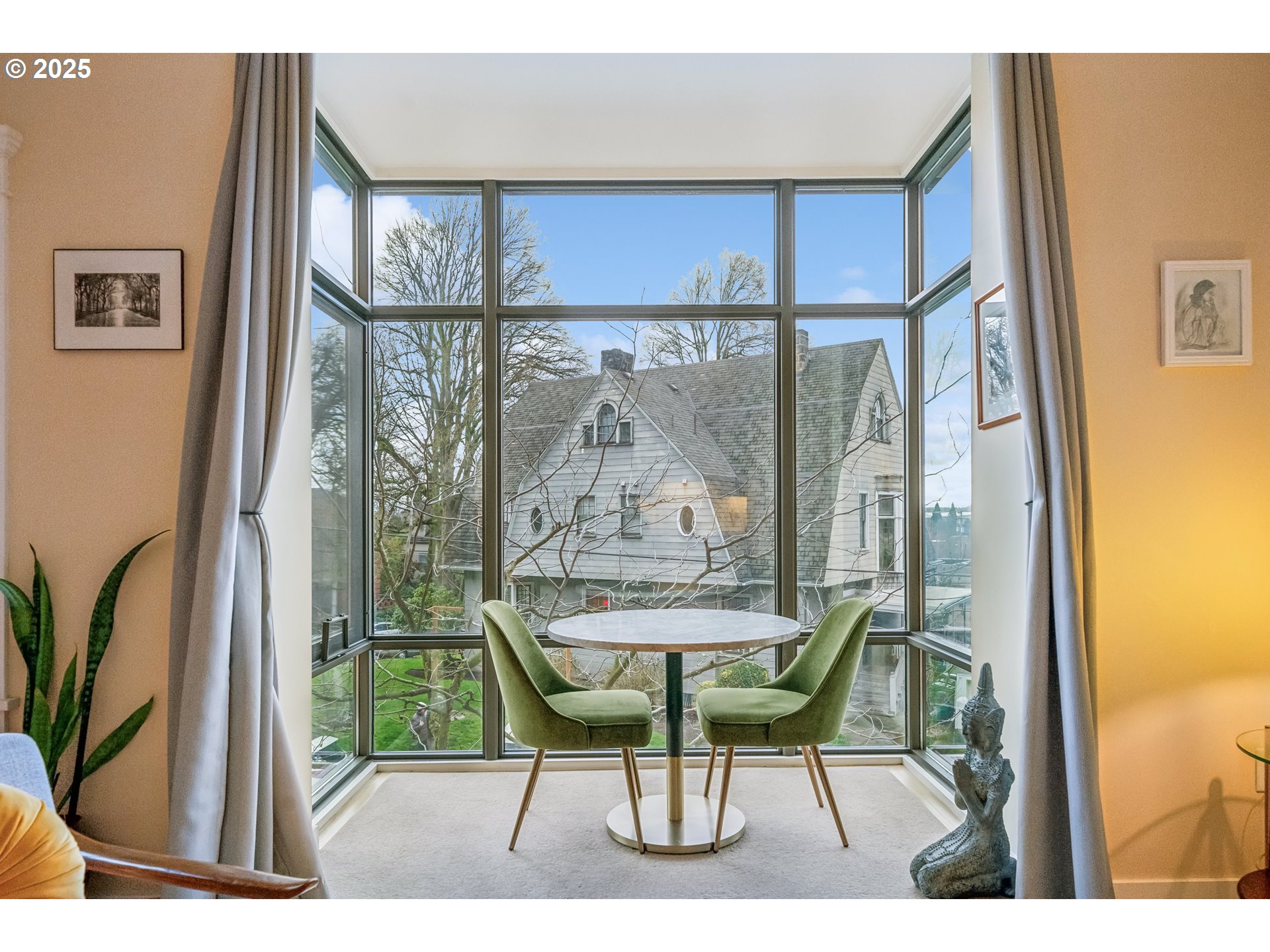 2351 Northwest Westover Road, Unit 315 Portland, OR 97210 - Photo 12 of 16 a balcony with table and chairs