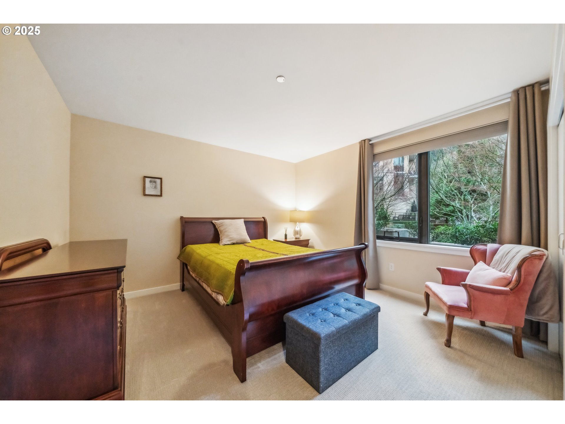 2351 Northwest Westover Road, Unit 315 Portland, OR 97210 - Photo 16 of 16 a bedroom with a bed and a couch