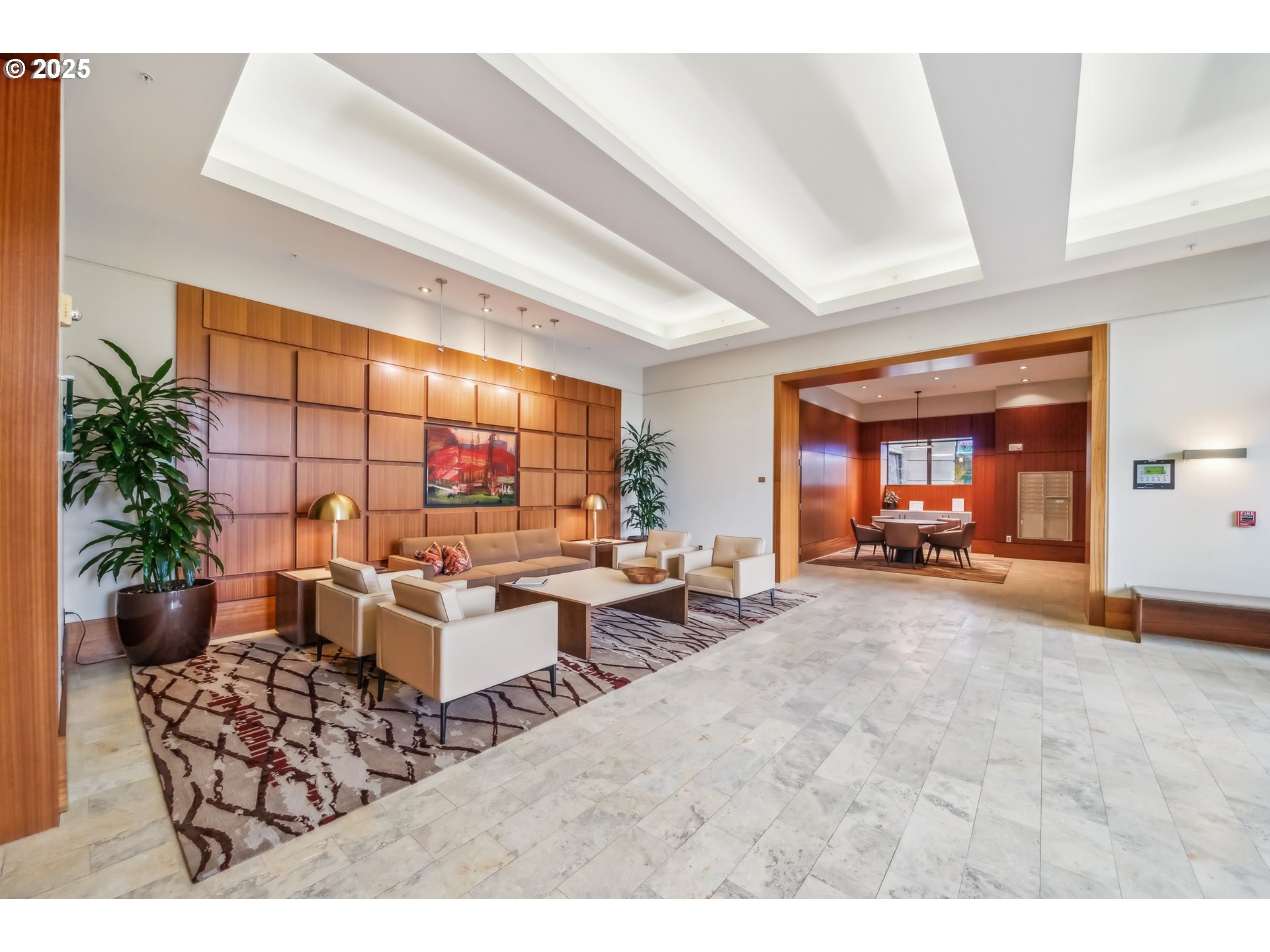 2351 Northwest Westover Road, Unit 315 Portland, OR 97210 - Photo 3 of 16 a living room with furniture and potted plants