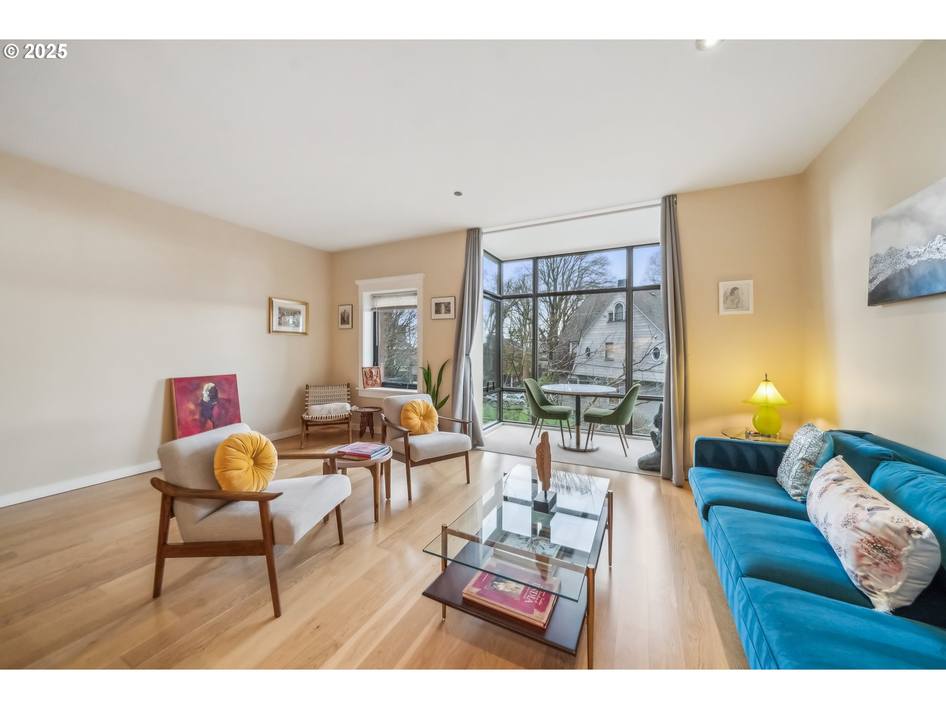 2351 Northwest Westover Road, Unit 315 Portland, OR 97210 - Photo 10 of 16 a living room with furniture and a table