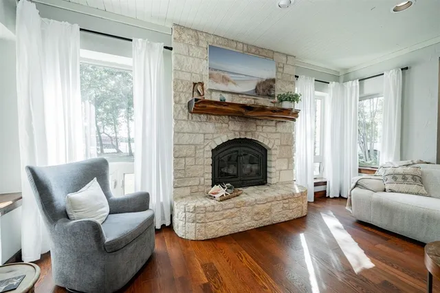 a large kitchen with kitchen island granite countertop a large counter top and stainless steel appliances