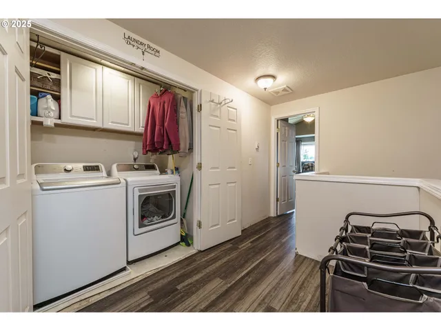 a kitchen with a stove and a microwave