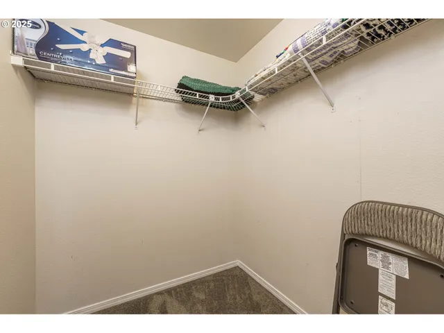 a view of a room with rack on the wall